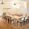 Thallern estate, © Freigut Thallern Conference room with tables and chairs, flipchart and chandelier.