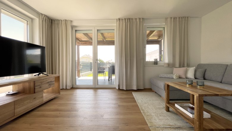 Wohnzimmer mit Zugang zur Terrasse, © Kay Haderer Wohnzimmer mit Zugang zur Terrasse, © Kay Haderer