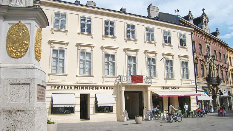 Historic building in Baden with stores on the first floor.