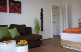 Wohnbereich, &copy; Homing Apartments