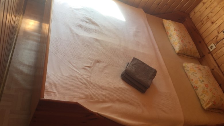 Cozy bedroom in a 100-year-old baggage car, &copy; M. Schorn